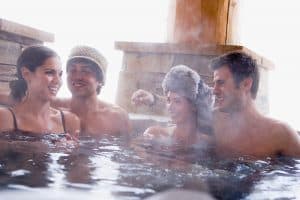 Young couples in a hot tub